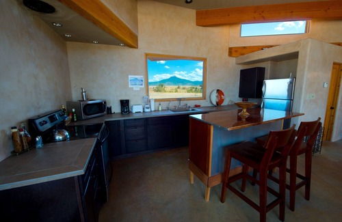 Youngsville House | Dual Master Bedroom: Designer Accommodations for the Long-Sta