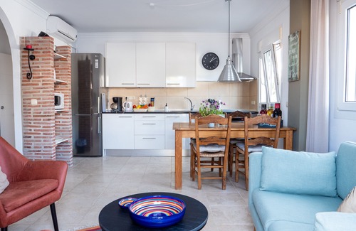 Bahia de Casares Apartment | Duplex apartment close to the beach, garden with great sea view and outdoor pool