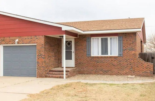 Dodge City House | Duplex Centrally located self check-in, wifi, attached Garage