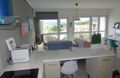 Santiuste Condo | Duplex near the beach with pool and surfer essence in gated community