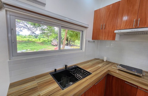 Dumaguete Apartment | E&C Tourist Inn near City Mall. Pet-Friendly!