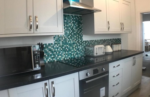 Rhyl House | Eastville Court - Stunning Bungalow in Rhyl - Families & Business Guests Welcome