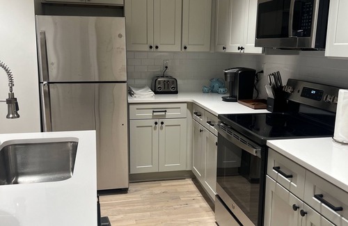Tupelo Apartment | Easy walk to restaurants, coffee and ice cream shops, retail shopping, and more!