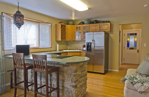 Colorado Springs House | Easy Walk to Shops, Restaurants and parks. Pet Friendly with fenced backyard.