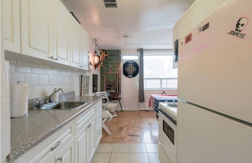 Parkdale Condo | Eclectic King west apartment with pool table.