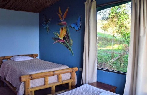 Turrialba House | eco bamboo house #2 surrounded by wildlife, gardens and waterfalls.