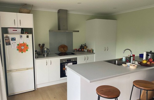 Otaki Beach Cottage | Eco- friendly cottage with meadow