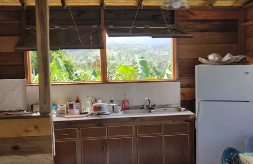 Calibishie Cottage | Ecolodge on 25 acre estate, 2 beaches, wide variety of fruit and flowers.