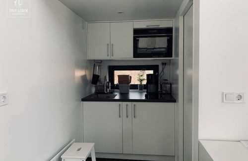 Stadtlauringen Apartment | Ecologically furnished tinylodge (25sqm) with sleeping lofts and terrace