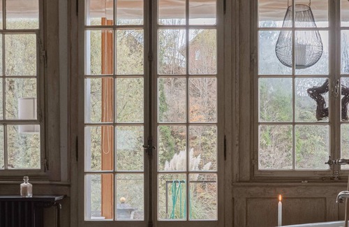 Buetschwil-Ganterschwil House | Ein Bijou mit Kachelofen, Garten und eigenem Fluss