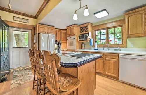 Alden Cottage | Elegant 1905 Home: Steps to Torch Lake & Dtwn
