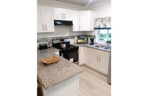 Great Harbour Cay Apartment | Elegant 2 Bedrooms Water Front Cottages