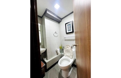 Bonifacio Global City Apartment | Elegant 2BR Loft | Pool View | Wifi & Netflix