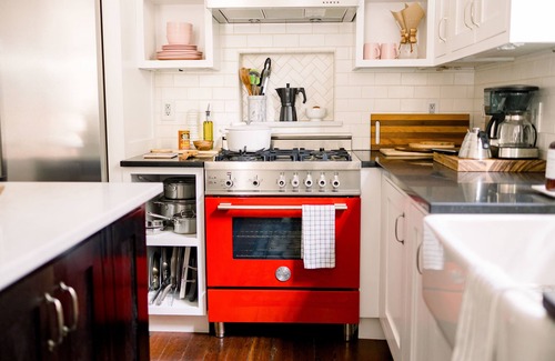 Touro Condo | Elegant Designer's Retreat in the Heart of Uptown on Magazine Street!