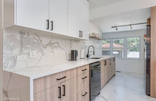 Elmhurst House | Elegant Haven: 4BR/3BA Retreat