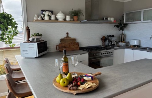 Devonport House | Elegant Home with Coastal Views