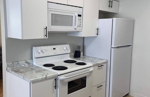 Brookline Station House | Elegant Modern 2BR Escape with Secure Garage Parking