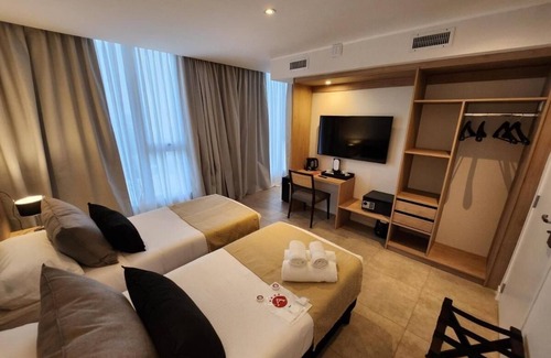 Rio Cuarto Hotel | Elegant Stay Near Plaza Estrada With Outdoor Pool Free Breakfast And Parking