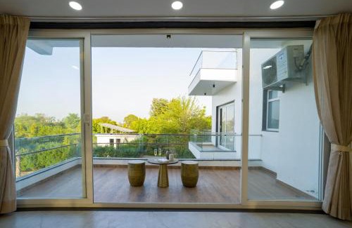 Bhiwadi Villa | ELIVAAS AdhiVa 5-BHK Farmhouse with Private Pool, Bar & Lush Garden