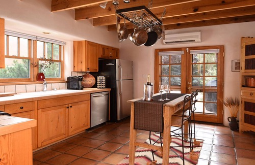 Historic Eastside House | Enchanting, romantic art-filled adobe, lush private gardens, short walk to Plaza