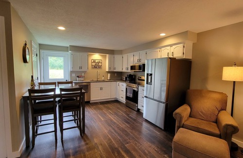 Burdett Apartment | End-unit apartment with spacious lawn