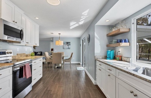 Grove City House | Englewood 2 Bedroom Canalfront Pool Cottage