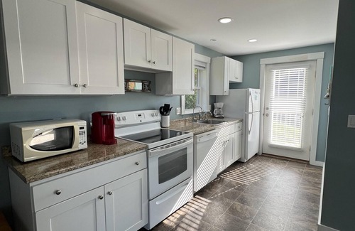 Mid-Coast and Islands House | Enjoy spectacular sunset and water views from the deck and balconies with water access.