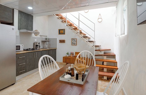 Zona Colonial Apartment | Enriquillo 2-bdrm apt with ensuite baths, full kitchen, and cozy living room.