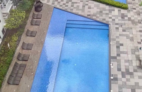 Manggahan Condo | Escape to 1028Suites! 2BR SMDC Charm Unit w/PS5 & 2 Pools!