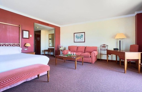 Cebreros Hotel | Escape to a Spacious Room Surrounded by Beautiful Gardens