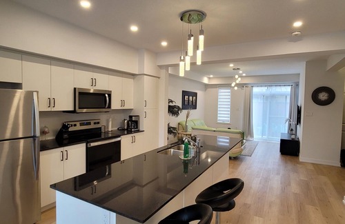 Hespeler House | Escape to our chic casita where modern comfort meets serene surroundings.