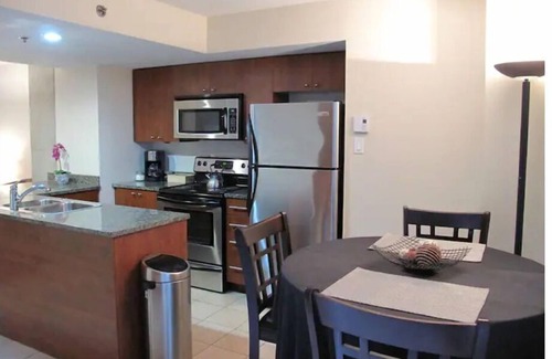International District Condo | EXECUTIVE LUXURY DOWNTOWN CONDO LOCATED BY THE OLD PORT WITH FREE GARAGE PARKING