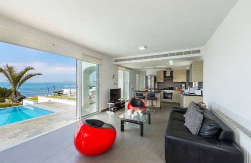 Kissonerga Villa | Executive Waterfront Villa with large pool, Spectacular Sunsets and Sea Views