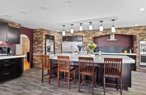 Scottsbluff House | Experience Scottsbluff charm in our spacious 4-bedroom retreat