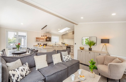 Bethesda Ski Chalet | Experience ultimate luxury with the brand-new Faraday lodge with hot tub.