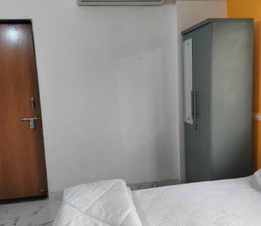 Tathawade Hostel | FabHotel Bizstay Executive