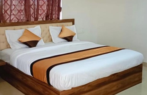 Devikolam Hotel | Falcone Residency - 100 m from Indiana Hospital