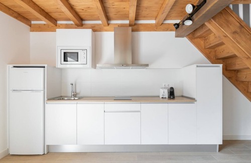 Villaverde de Pontones Apartment | Family apartment with garden view and chill-out cube in the garden