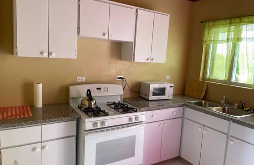 Nassau Apartment | Family-Friendly 2 Bedroom 1 Bath Fully equipped AirBnB! Complimentary Amenities!