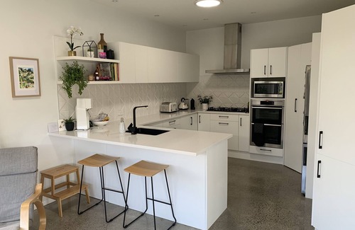 Papamoa Beach House | Family Friendly Retreat + Pool & Spa