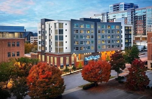 Greenville Downtown Apartment | Family Retreat w/Queen Beds, Indoor Pool Access, Near Peace Center & Museums