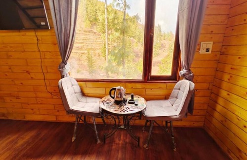 Fagu Cottage | Family Room with Mountain View - Snowind Cottagesn