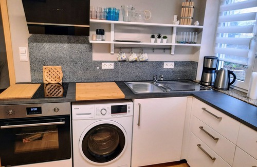 Gruensfeld Apartment | Family vacation apartment with private terrace, W-Lan, pet-friendly.