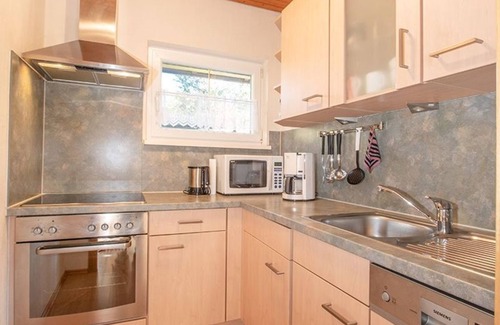 Schwarzenbach House | Ferienhaus 46-f - Landhaus Wetterstein - Ferienhäuser im Feriendorf Weissensee im Allgäu