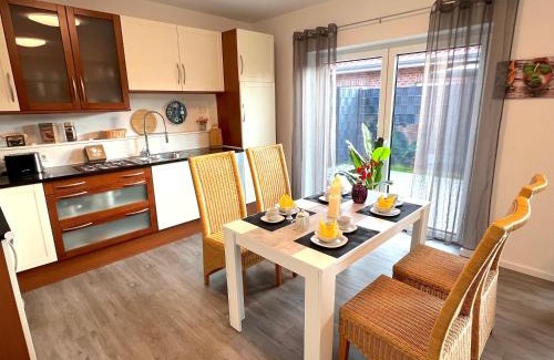 Apeldorn Apartment | Ferienhaus "Jonagold" Meppen Ebenerdig Carport Terrasse Free WiFi 2 Schlafzimmer Küche Gäste-WC Wallbox