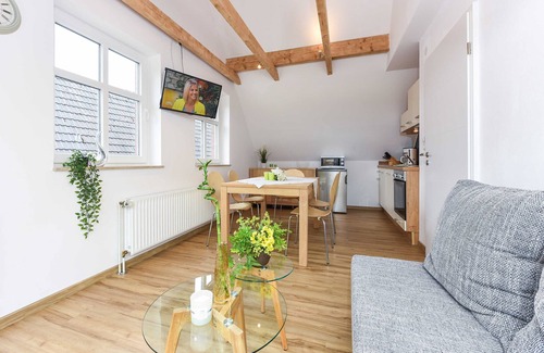 Neuharlingersiel Apartment | Ferienwohnung Flut - Meeresleuchten in Neuharlingersiel
