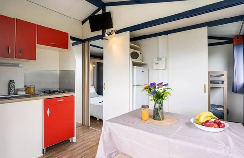 Guidel-Plages Ski Chalet | Flower Camping Jardins de Kergal * - Chalet Standard 20m2 2Ch - TV 4 persons