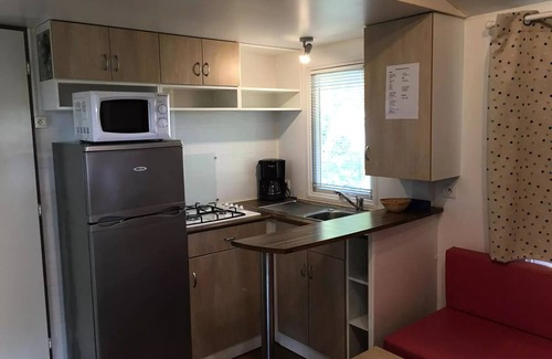 Lansargues House | Flower Camping Le Fou du Roi * - Mobile home Cottage Comfort 29 m2 (2ch - 4 pers) + TV + Terrace semi covered 4 people