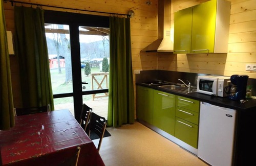 Ranspach Ski Chalet | Flower Camping Les Bouleaux * - Chalet CONFORT+ 24 m2 (2 bedroom) + covered terrace 4 people