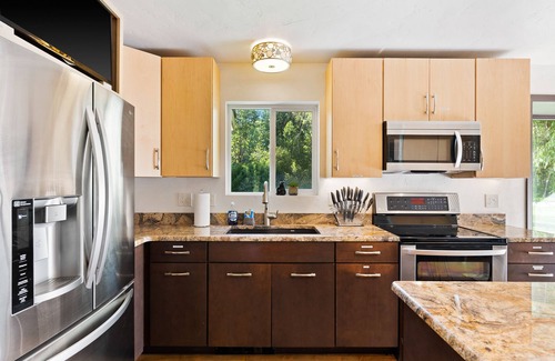 West Glacier House | Fly-Fishing Haven, 5 Min to Glacier Park, Scenic Home with Hot Tub & Firepit
